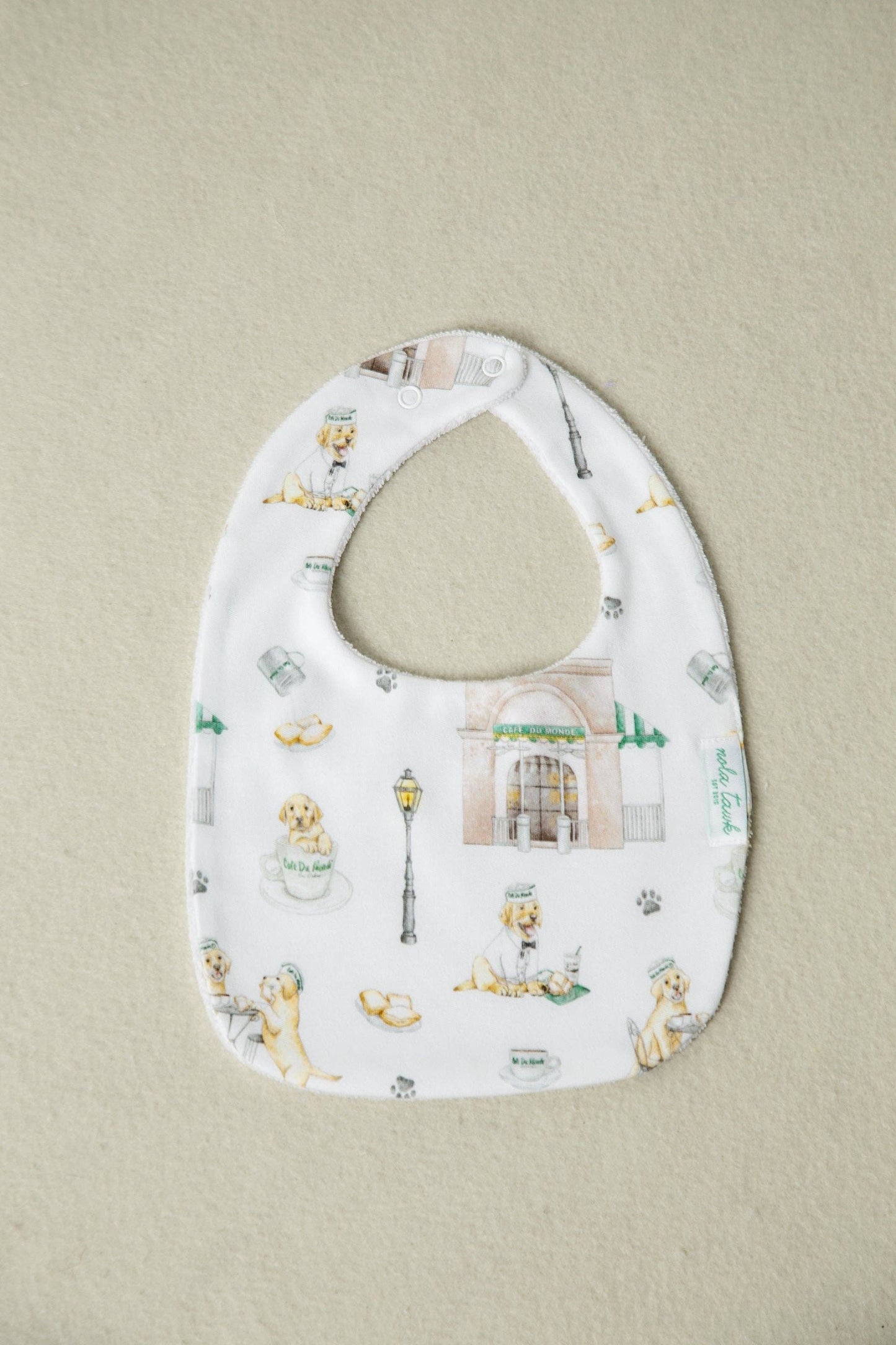 Nola Tawk- Powdered Sugar and Puppies Organic Cotton Baby Bib